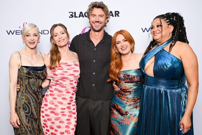 Isla Fisher Stuns in Sexy Strapless Gown, Flaunting Cleavage at Hamptons Screening